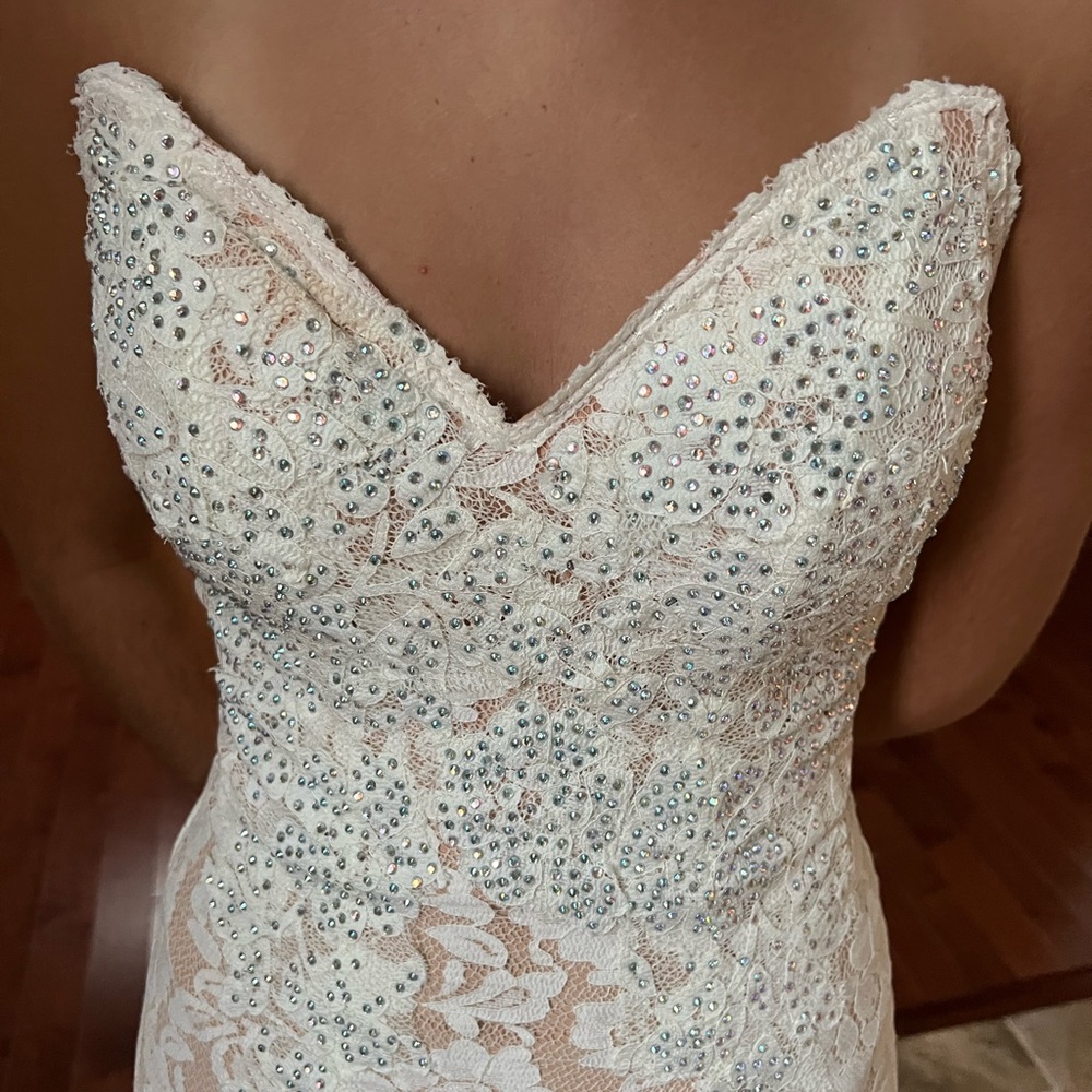 Jovani studded strapless Prom/Wedding dress. Ivory in color. Mermaid style.